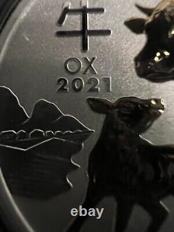 2021 year of the ox 1 ounce 99.99% silver gilded Australian Coin. The PERTH MINT